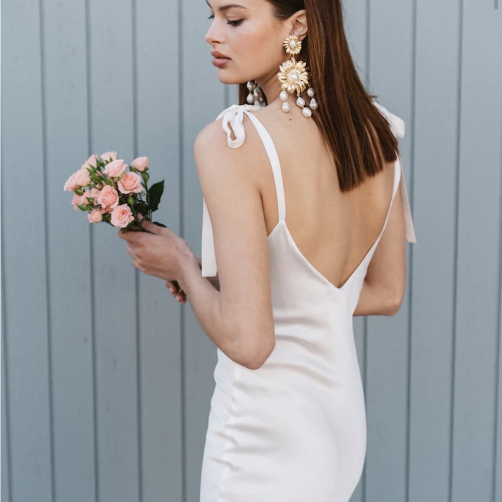 100% silk white midi dress. I didn't end up wearing